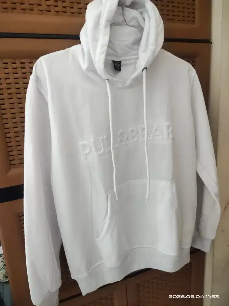Jaket putih bekas pakai