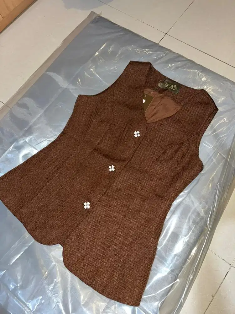 Baju vest, baru masih mulus