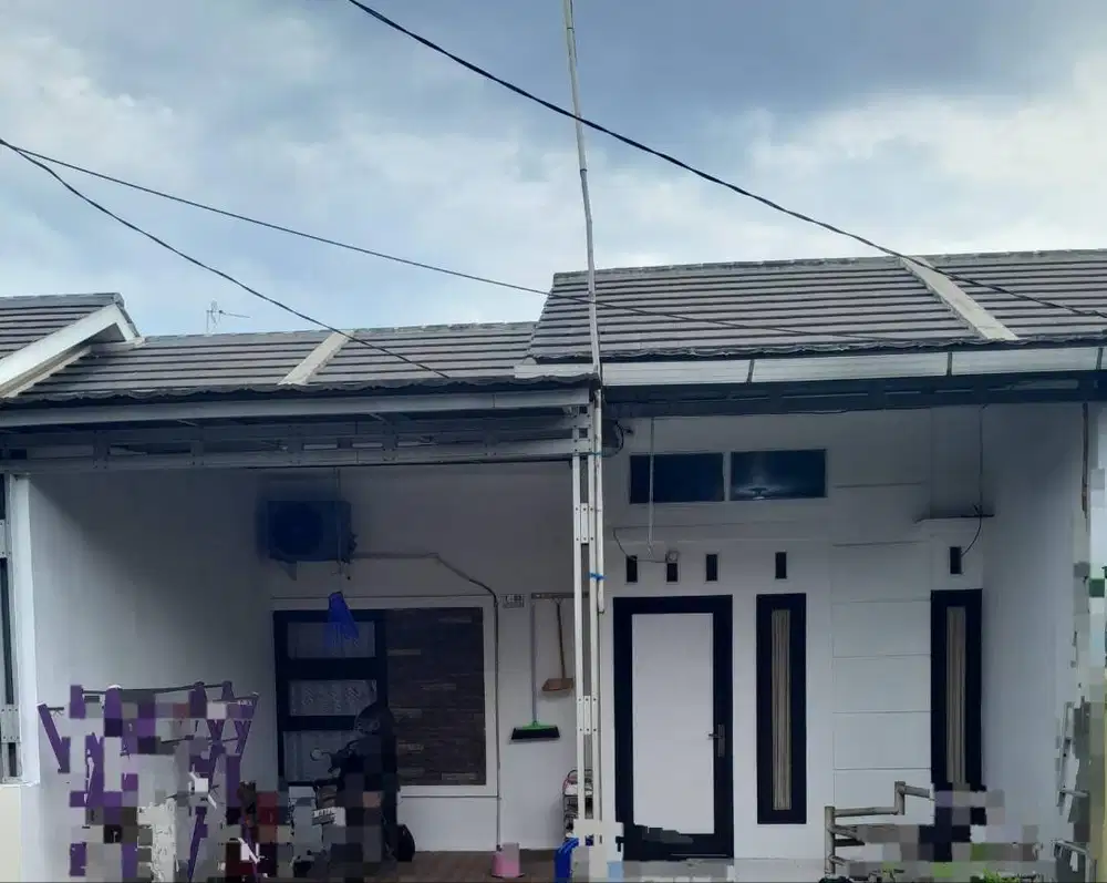 Over kredit perumahan cluster perumahan green sentosa asri