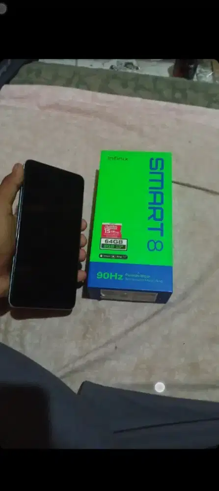 Infinix smart 8 4/64.