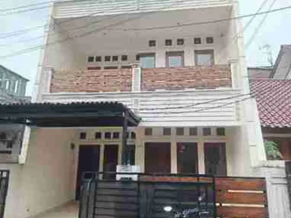 rumah 2lt 4km jl 2 mobil 
di komplek pondok kelapa