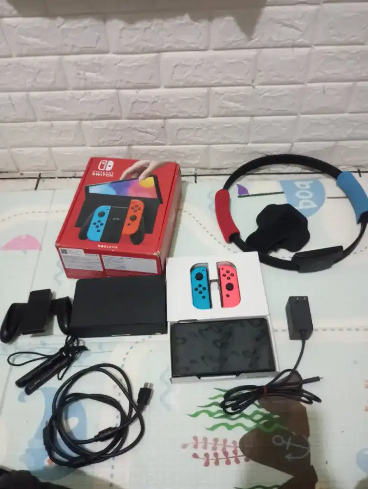 Nintendo Switch Oled neon ceefwe 128gb+Ringfit