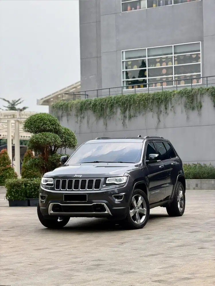 CASH LOW KM Jeep Grand Cherokee 2015 New Model Summit Model