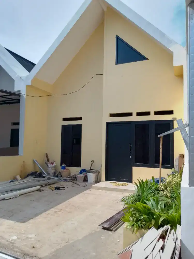 rumah cluster di pinggir jalan raya sawangan dekat pintu tol