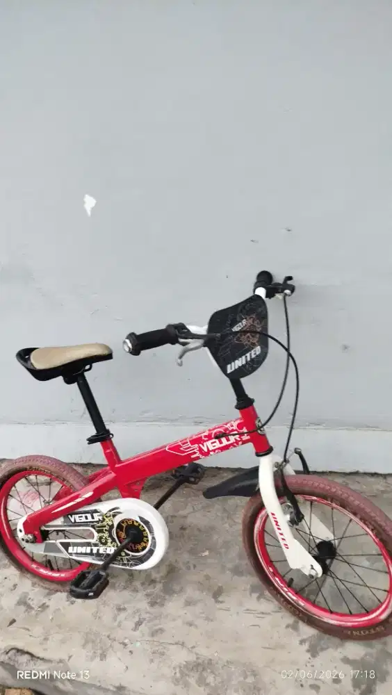 Sepeda anak united original cewek cowok oke merah ferarri