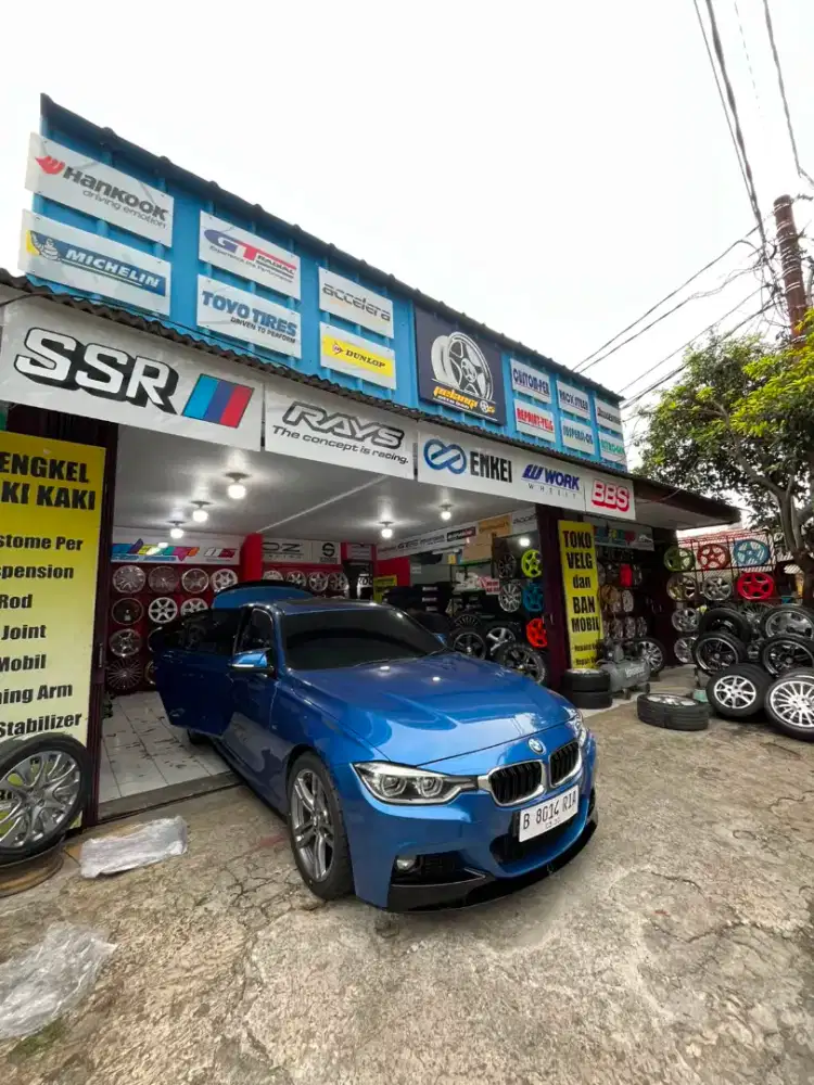 Teknisi kaki-kaki mobil