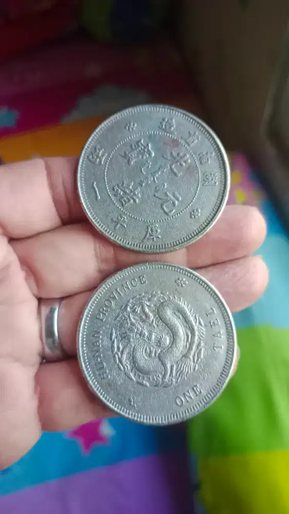 Coin naga antik/unik