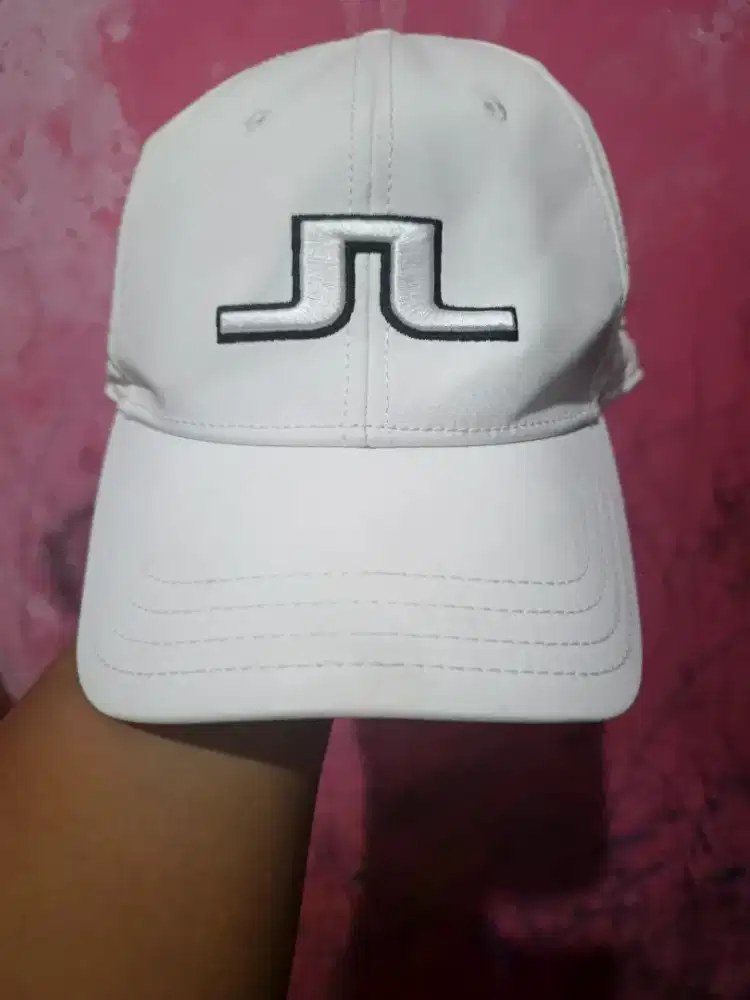 Bismillah, dijual topi golf J. Lindeberg original