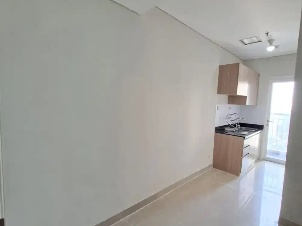 1BR Unfurnished Apartemen Madison Park - Mall Central Park
