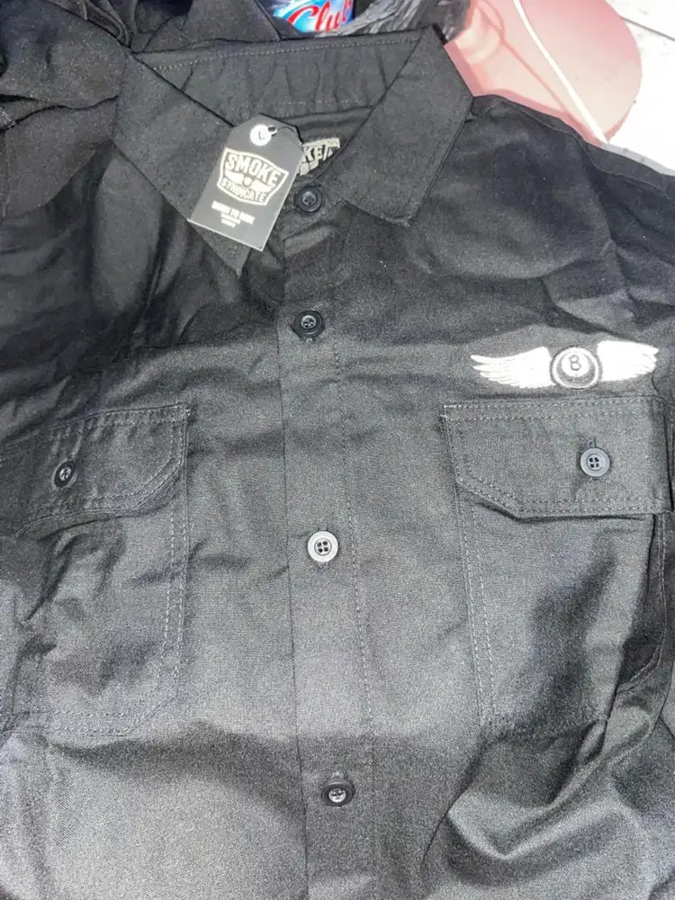 Baju hitam merk