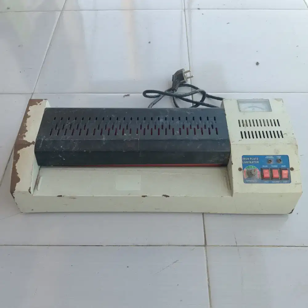 Mesin laminating berminus