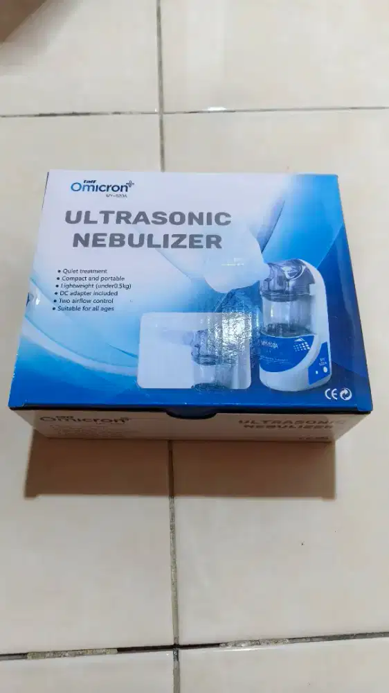Taff omicron nebulizer alat bantu pernafasan