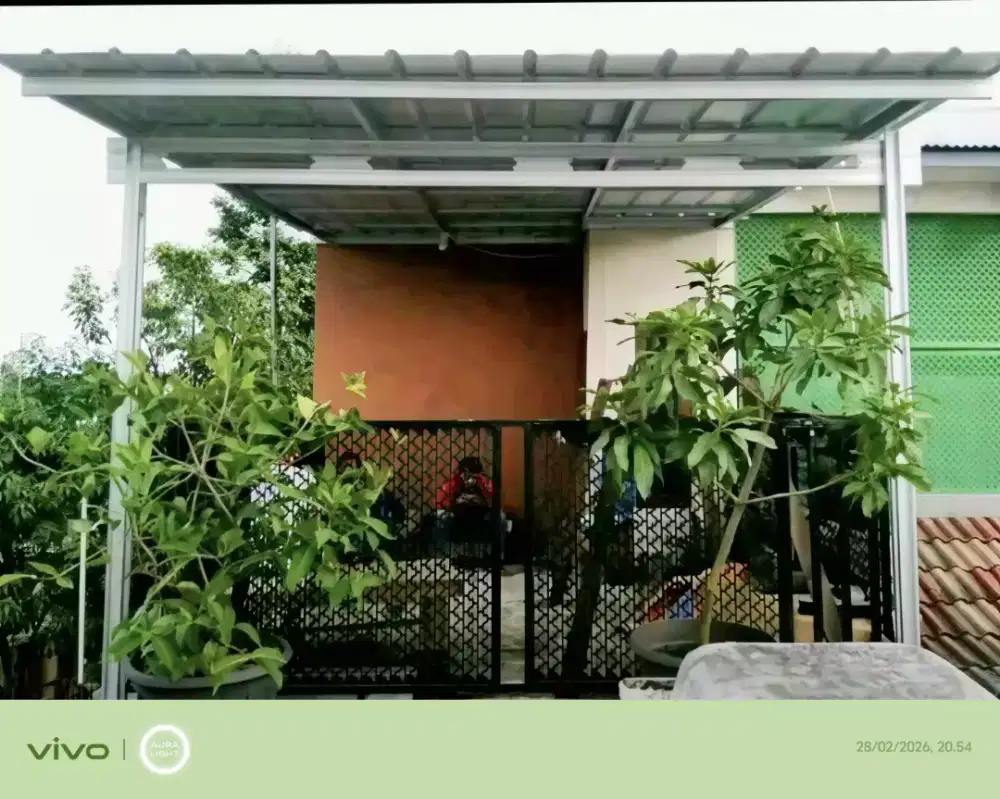 Kanopi baja ringan dan garasi