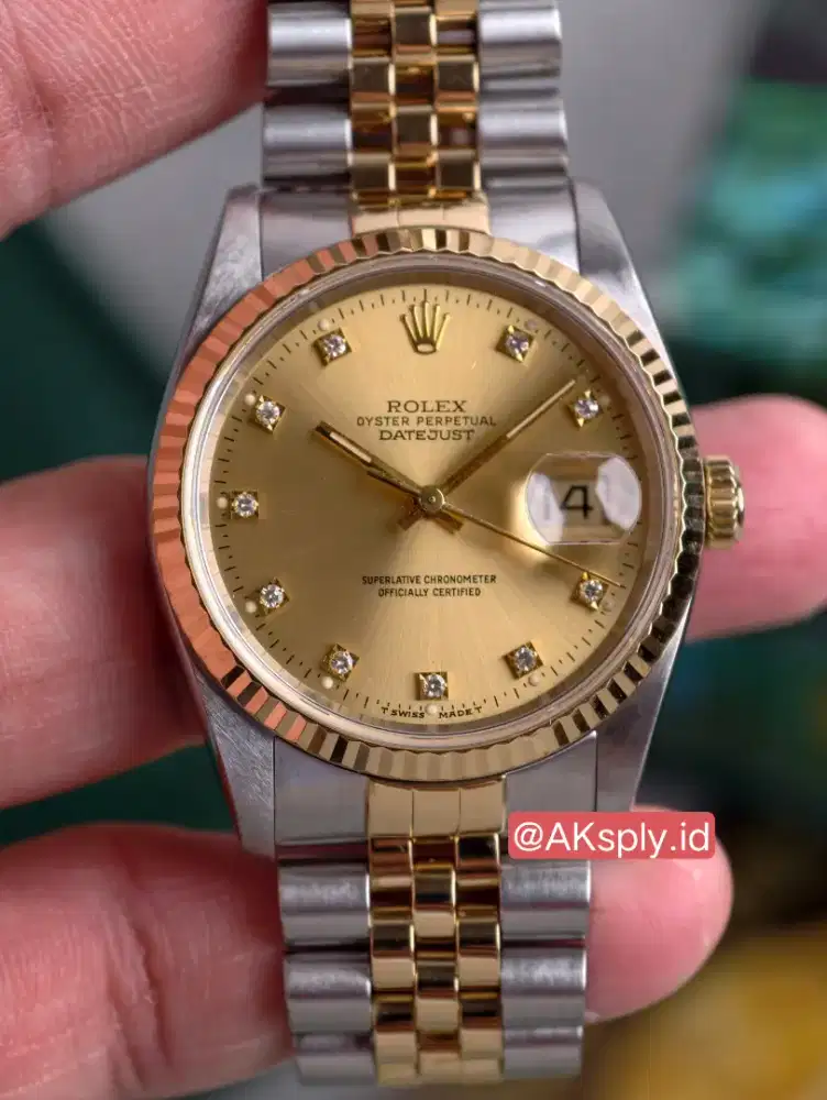 Rolex Datejust 36 16233 Champagne

Diamond Dial Jubilee Bracelet