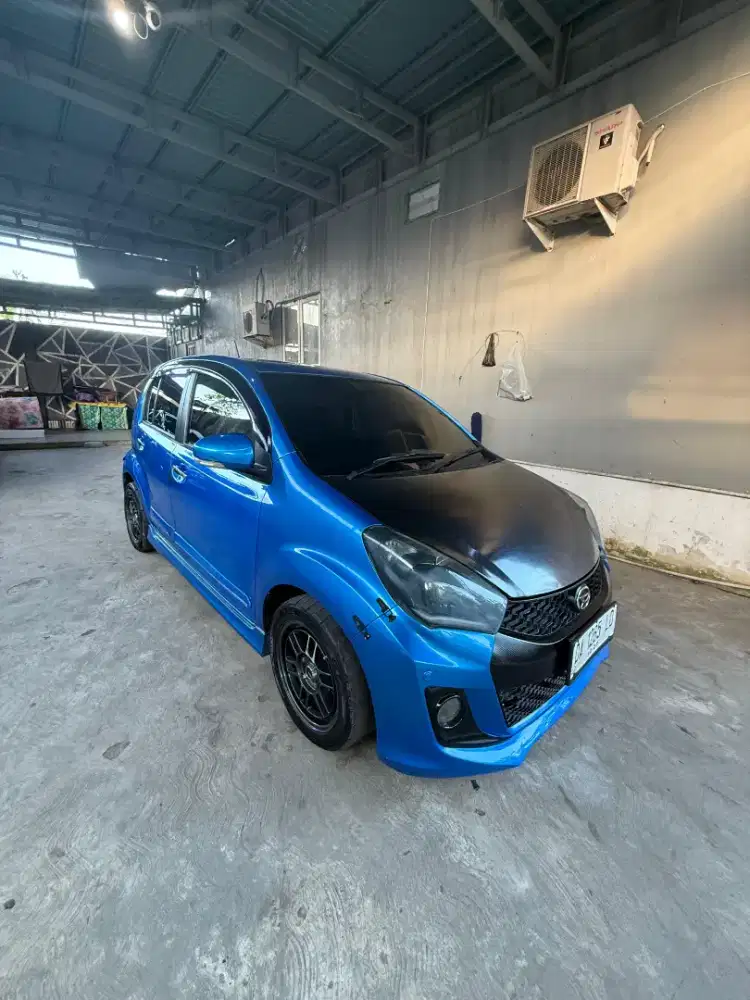 Daihatsu Sirion 1.3 RS MT 2017 istimewa pakaian pribadi mulus terawat