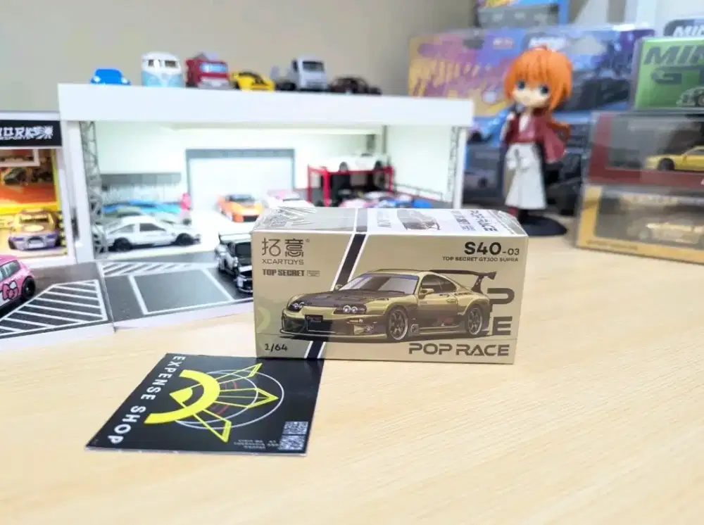 Poprace Xcartoys Top Secret GT300 Supra Carbon Hood Chrome Gold