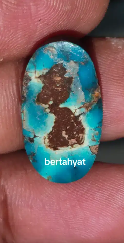 Batu pirus motif orang tahyat