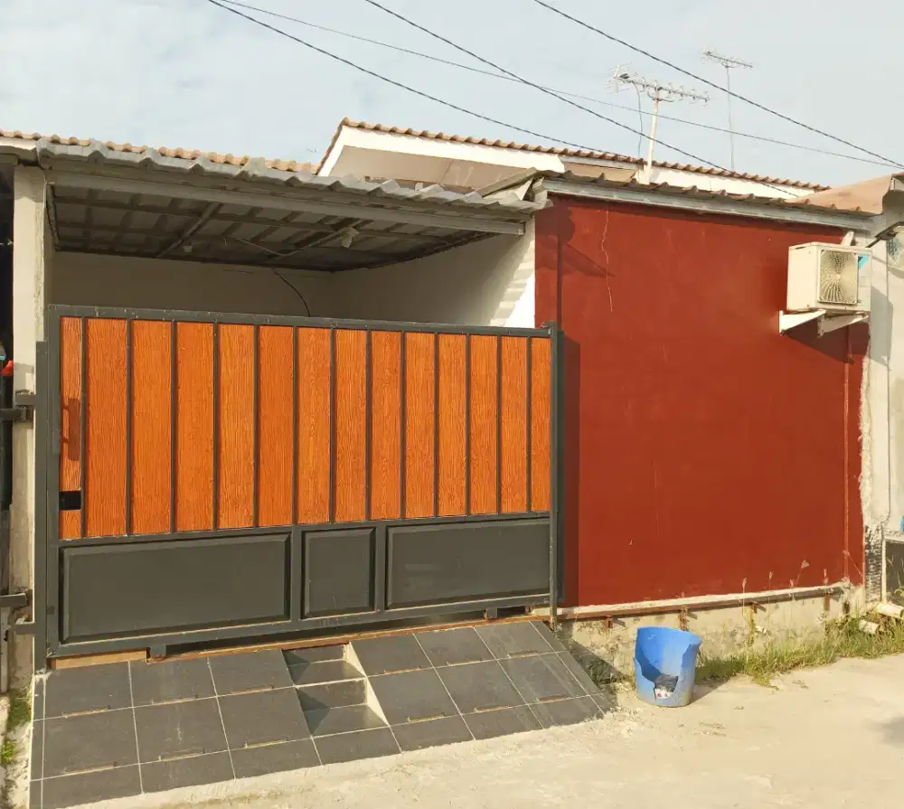 Over kredit rumah