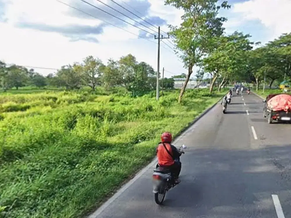 JUAL TANAH JALAN RAYA SURAMADU  SIAP BANGUN RUKO GUDANG GEDUNG ARAH BANGKALAN MADURA