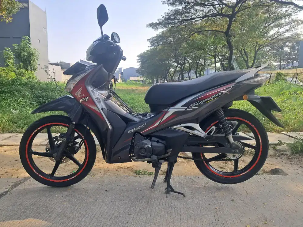 Motor Supra Helm-in 125 Tahun 2015