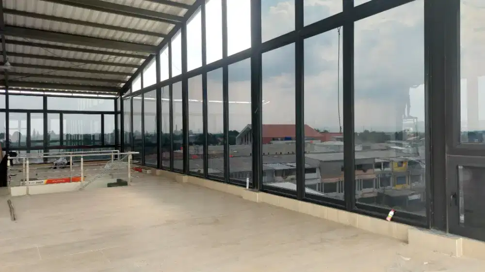 Jasa pasang sticker kaca film gedung kantor rumah ruko