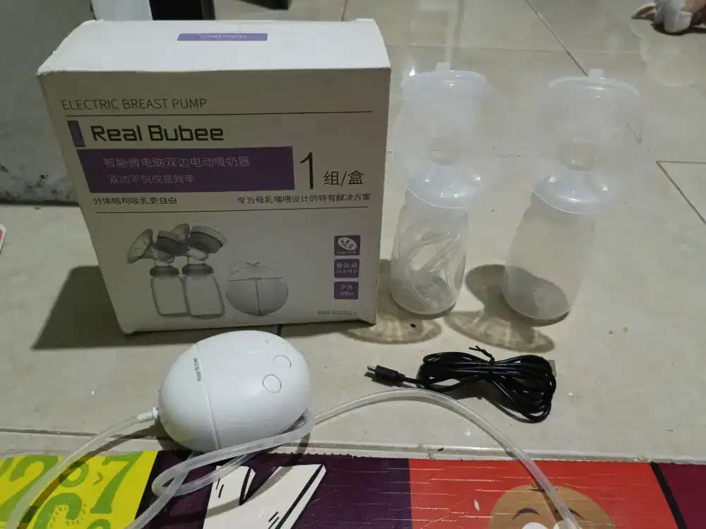 Pumping bayi/pompa asi elektrik
