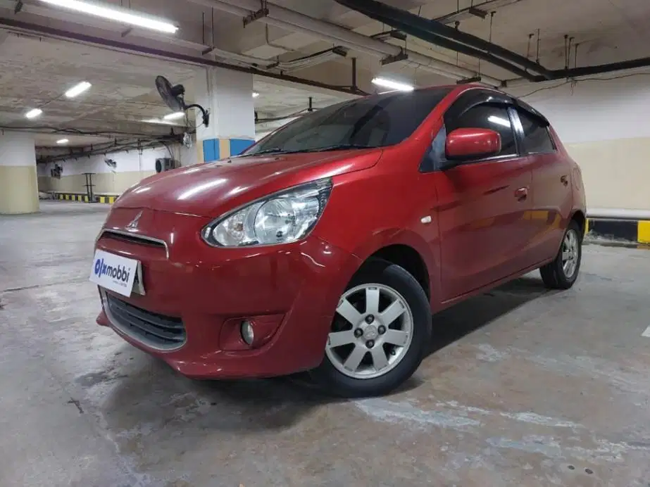 DP MURAH Mitsubishi Mirage 1.2 Exceed Bensin-AT 2013 Merah CNOAB