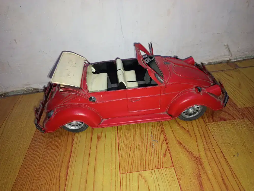 Mainan mobil jadul seng