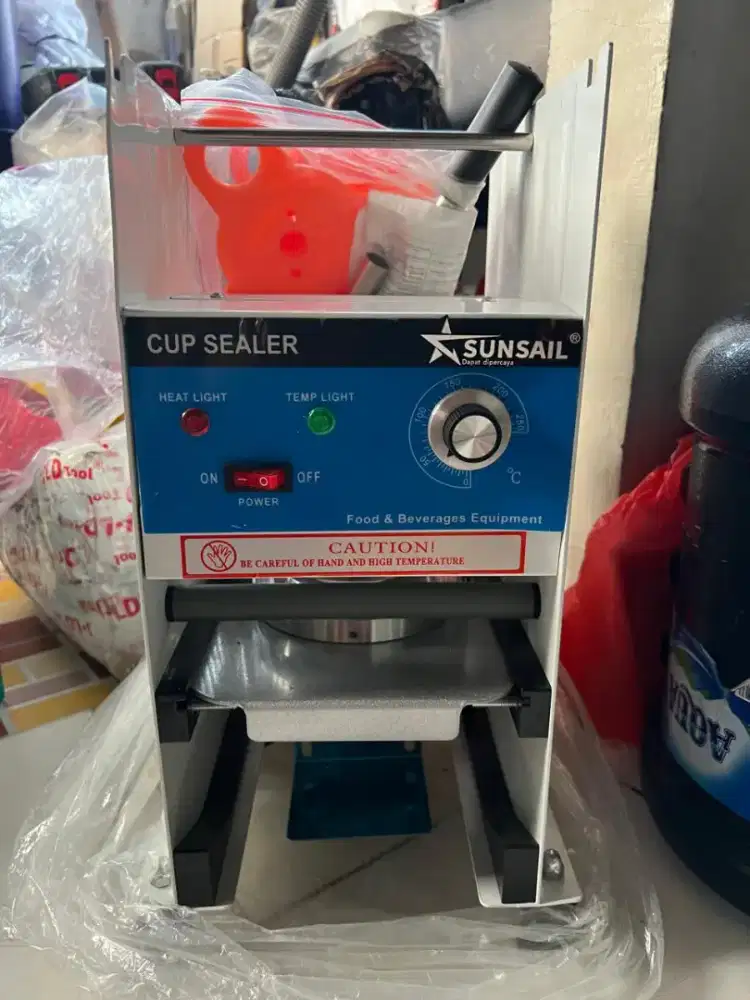 Mesin press gelas plastik