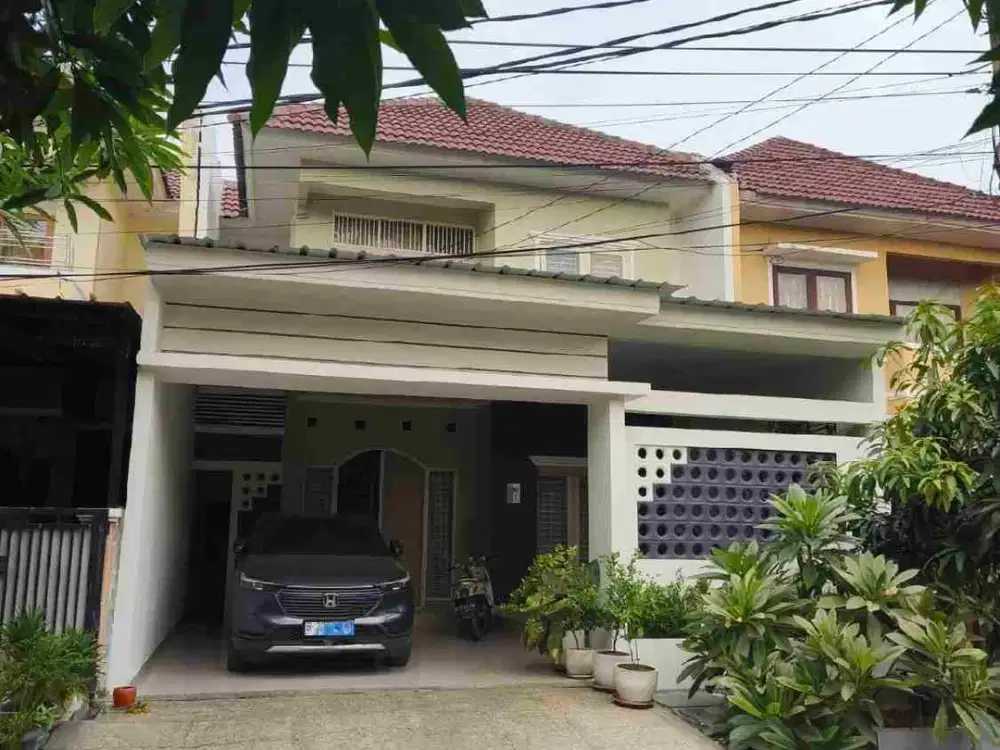 Rumah cluster siap huni 2 lantai LT 144 LB 200 nyaman asri di Taman Harapan Baru