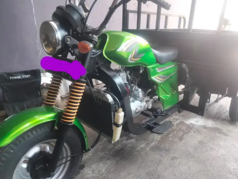 Motor roda tiga