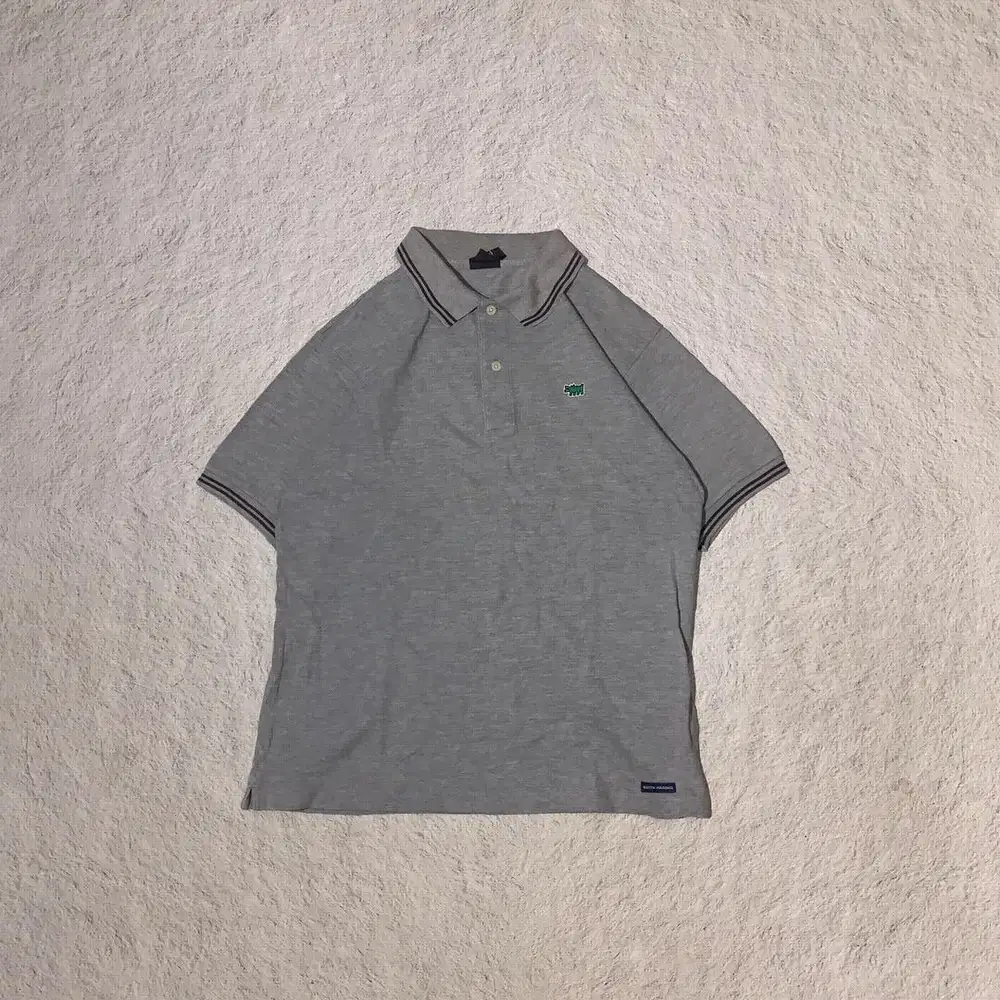 Polo Shirt Uniqlo x Keith Haring