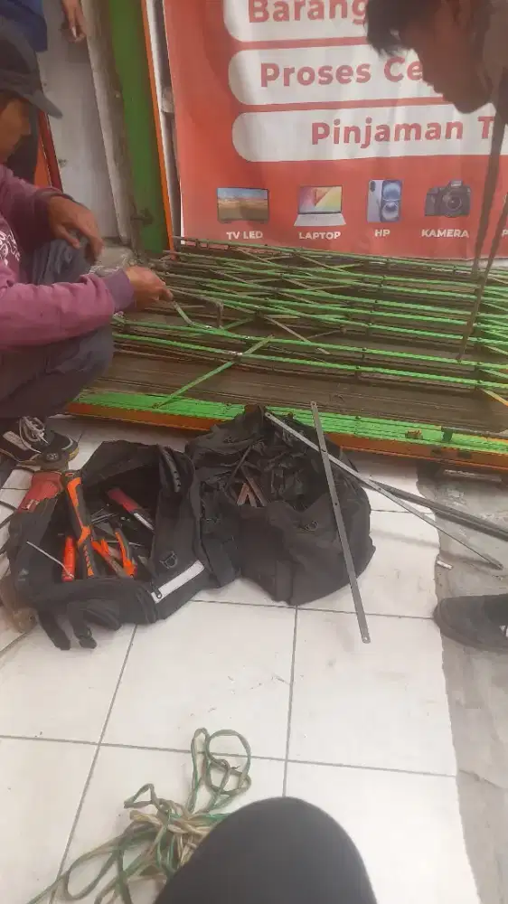 Tukang service rolling door folding gate murah