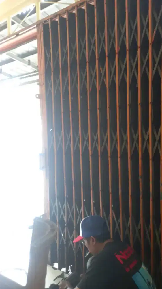 Tukang reparasi bongkar pasang rolling door folding gate