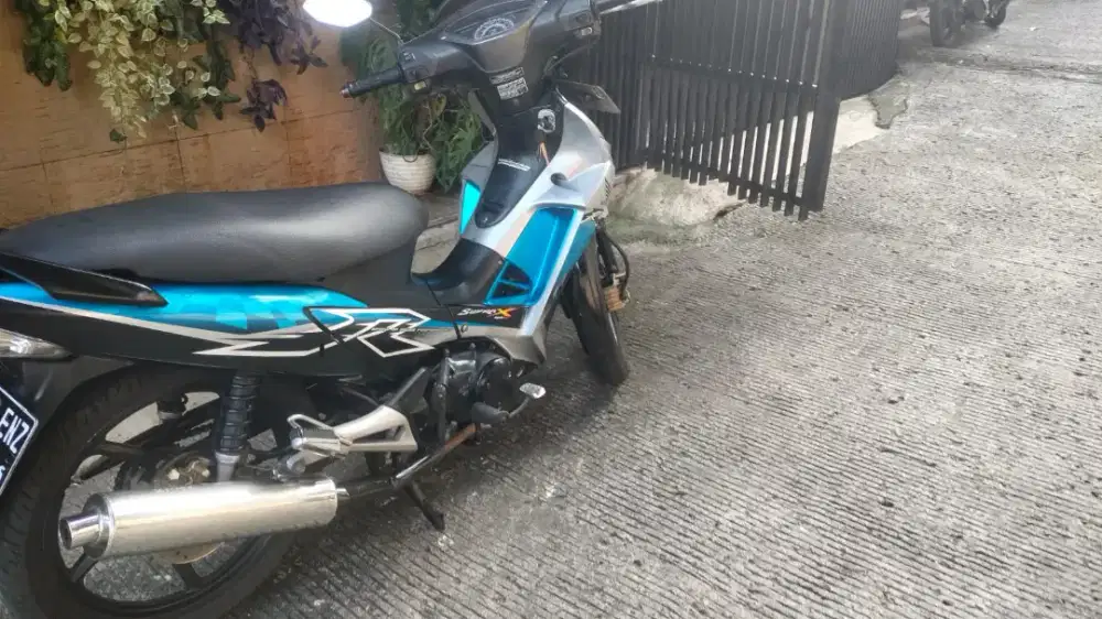 Honda Supra X 125  DD Carbu 2009