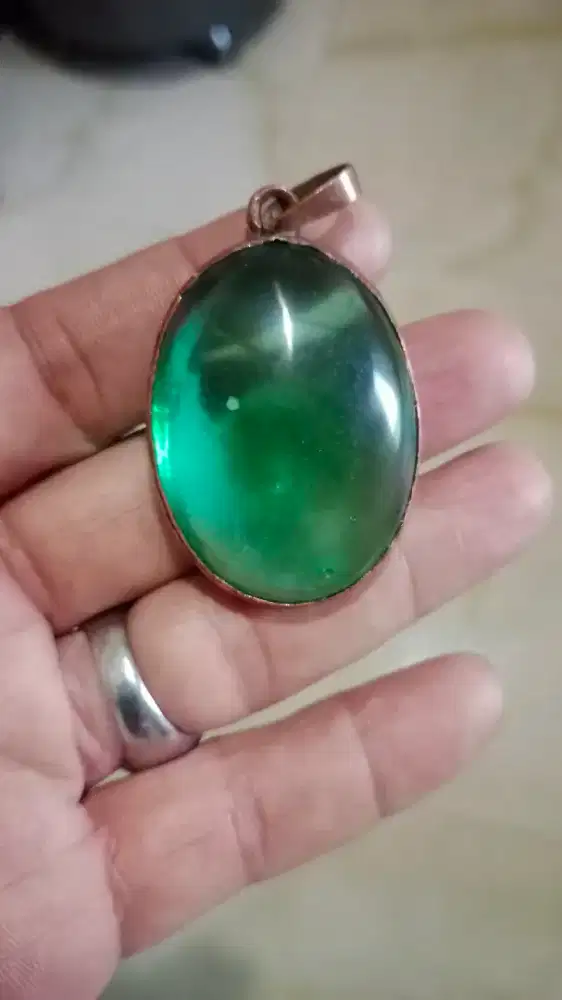 Liontin batu cyclop papua