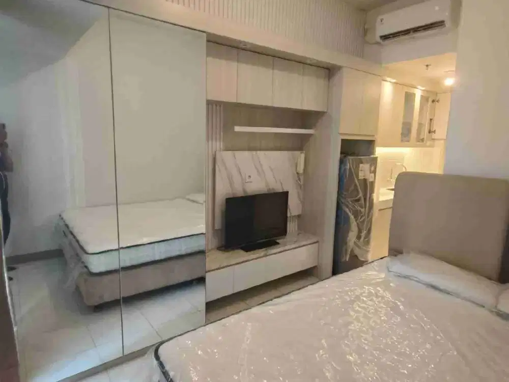 Di Sewa Apartemen Tokyo Riverside PIK 2 furnish.