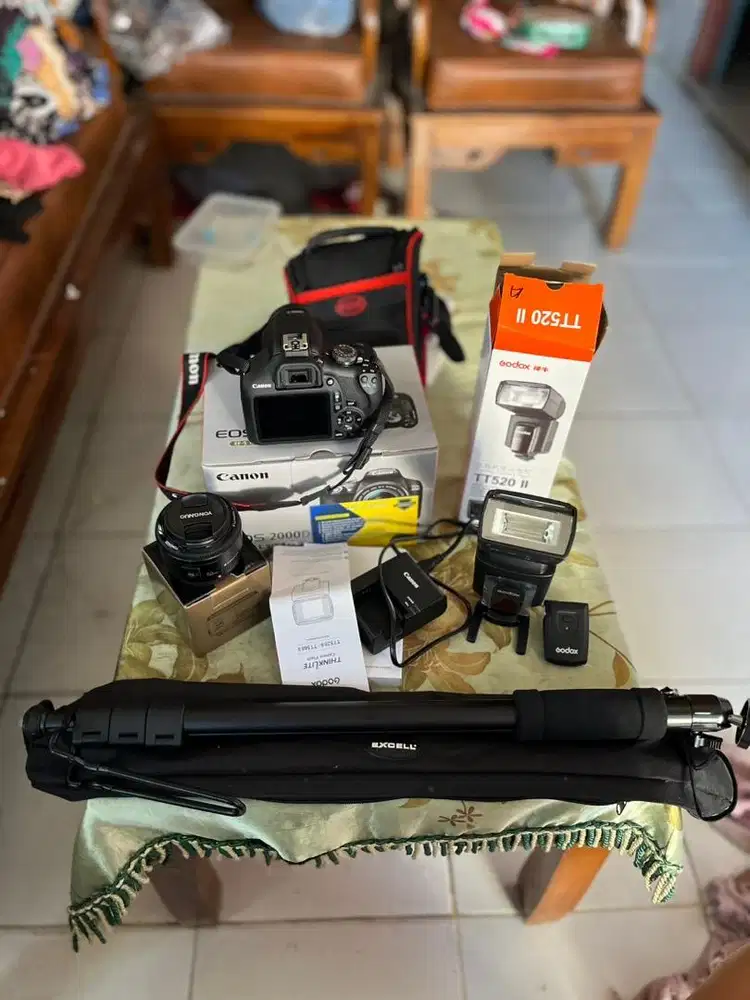 Canon 2000D garansi