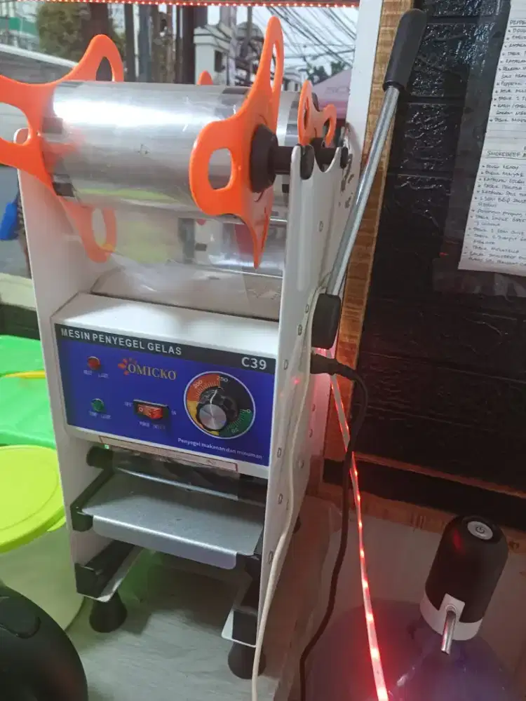 Mesin penyegel gelas cup sealer