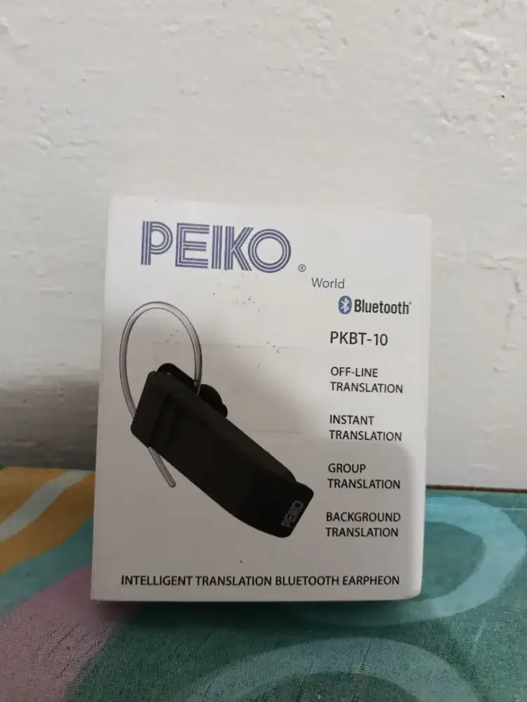 Dijual PEIKO World PKBT-10 Intelligent Translation Bluetooth Earphone.