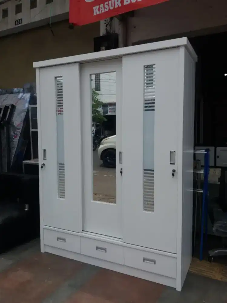 LEMARI BAHAN TRIBLOK 3 PINTU