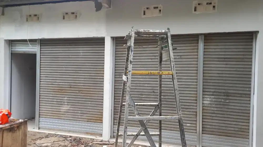 Tukang perbaikan pintu rolling door folding gate murah