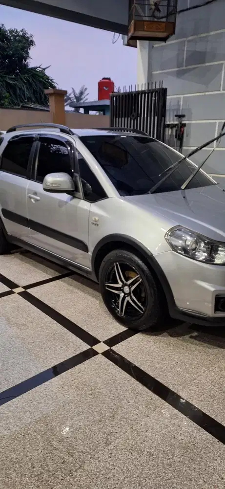 Suzuki SX4 2012 Bensin