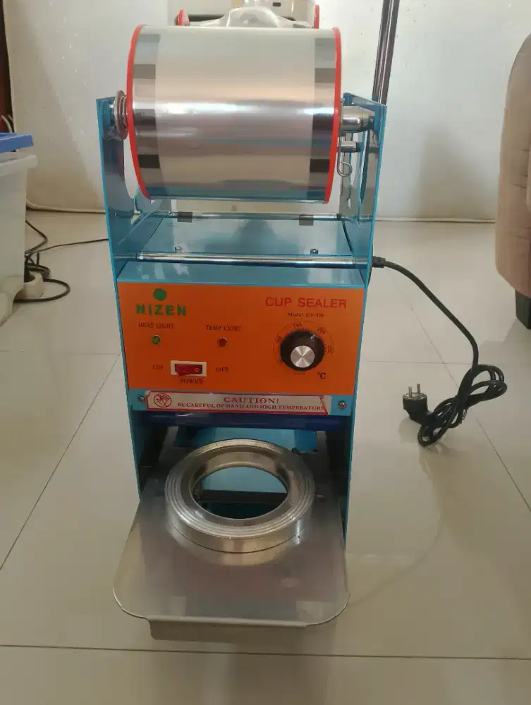 Mesin cup sealer