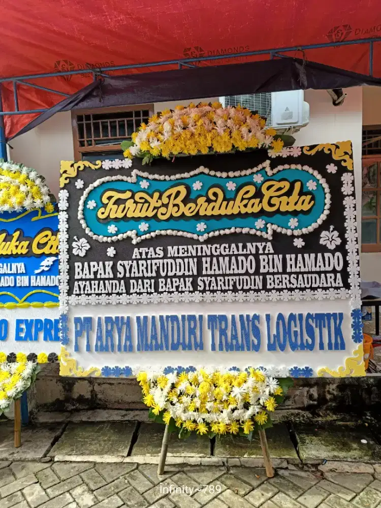 karangan bunga papan