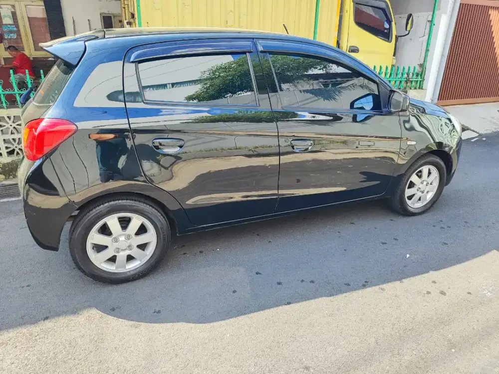 Mitsubishi mirage exceed 2012 matic KM Low
