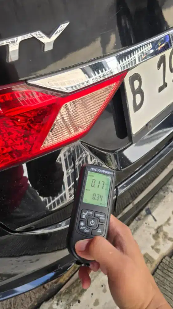 Inspeksi inspektor mobil bekas