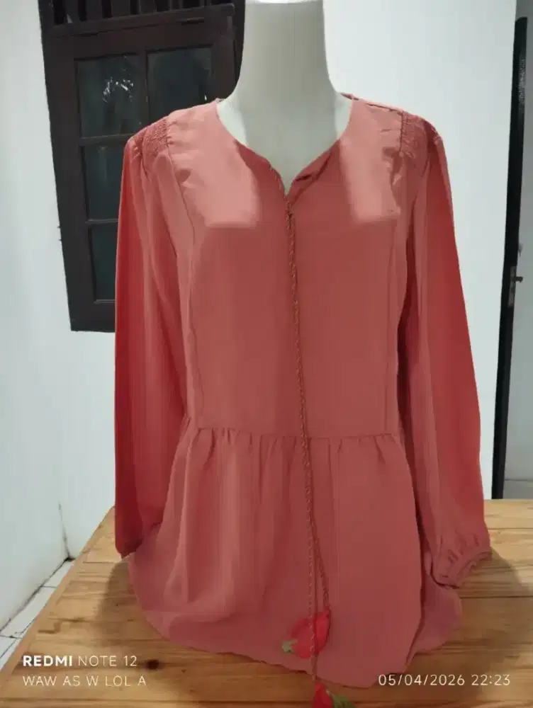Baju oren lengan panjang