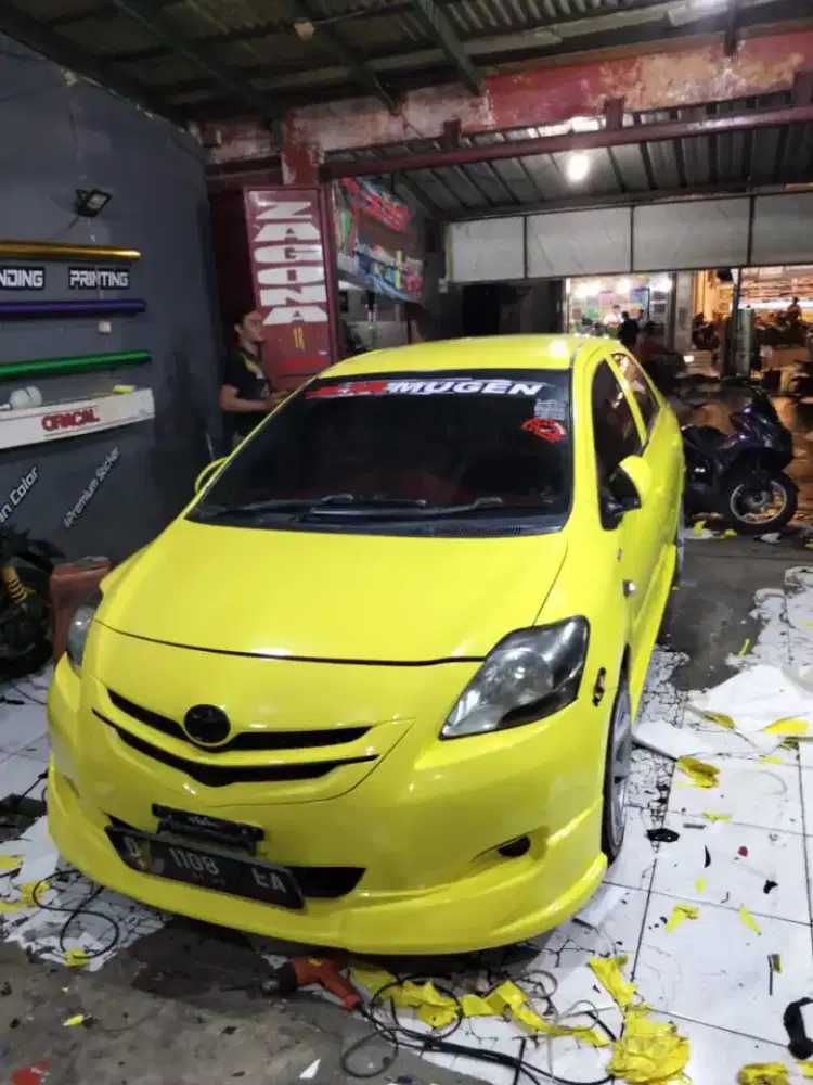 Jasa pasang sticker mobil motor