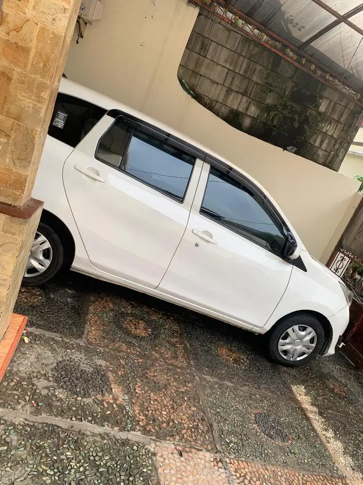 Over Kredit Sigra x 2019